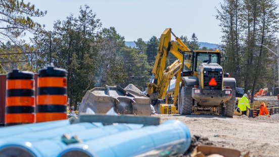 Construction equipment working in McAuley intersection
