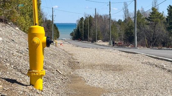 Fire hydrant at side of graveled area