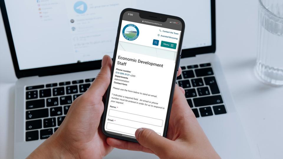 Smartphone showing website contact form for Economic Development Staff
