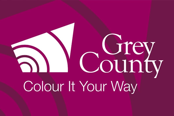 Grey County Logo with purple background
