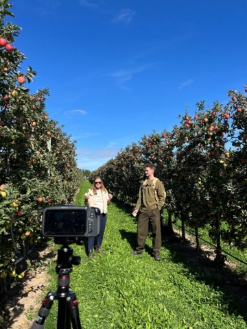 Green Grey Blue filming in an apple orchard